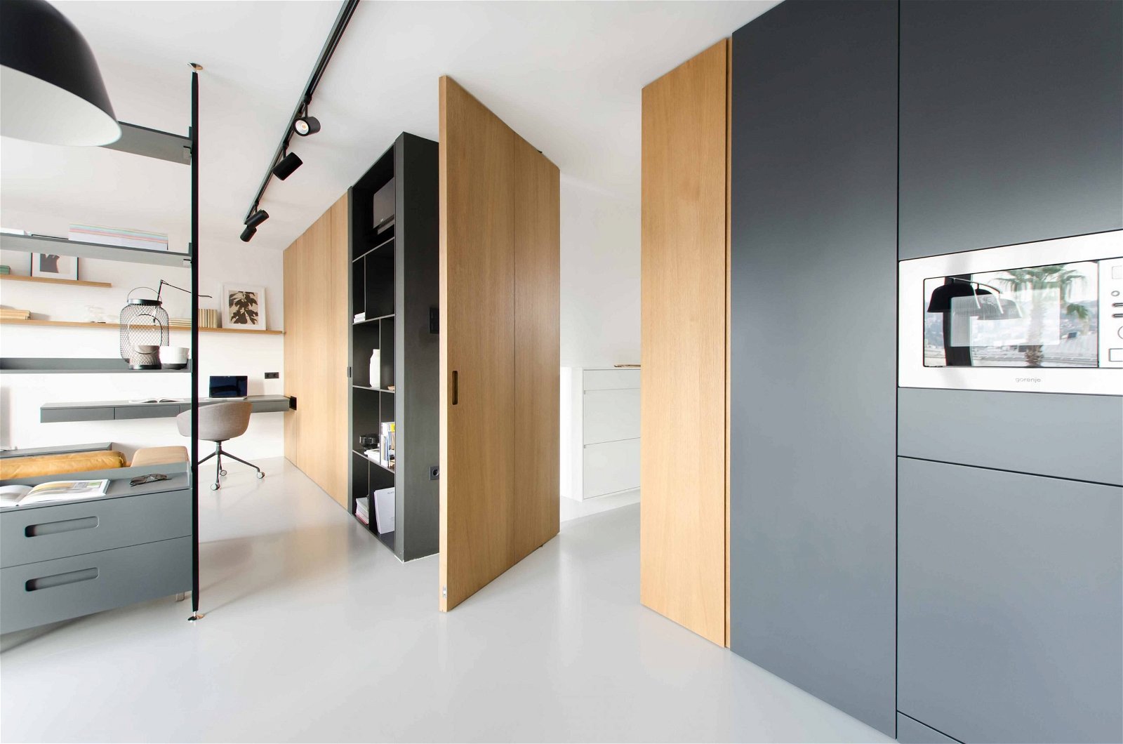 Interior-design-by-marasovic-arhitekti-with-pivot-door-with-FritsJurgens-pivot-hinge-system-scaled.jpg