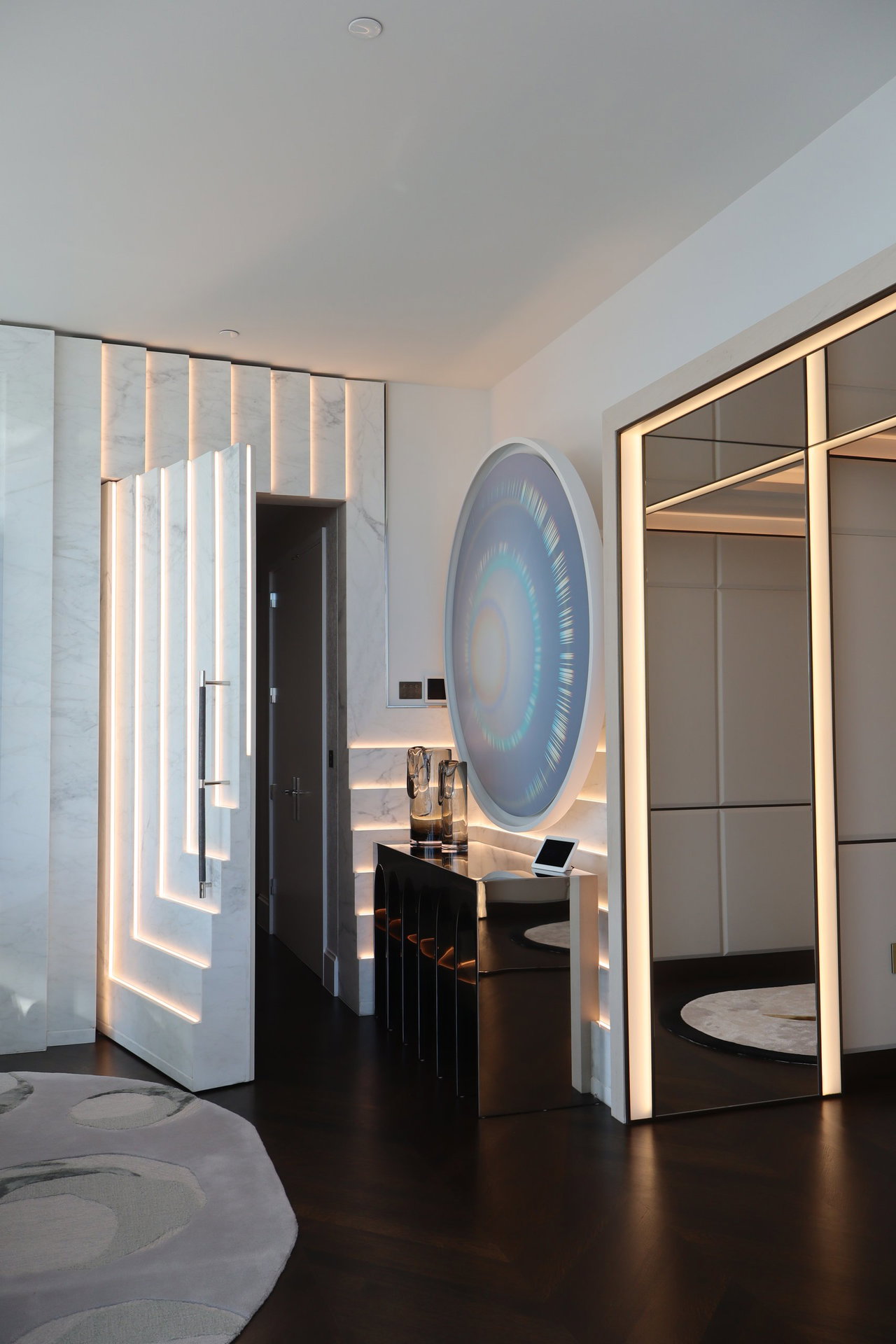 Marble pivot door in a private home in New York City with FritsJurgens System M+ pivot hinge system inside