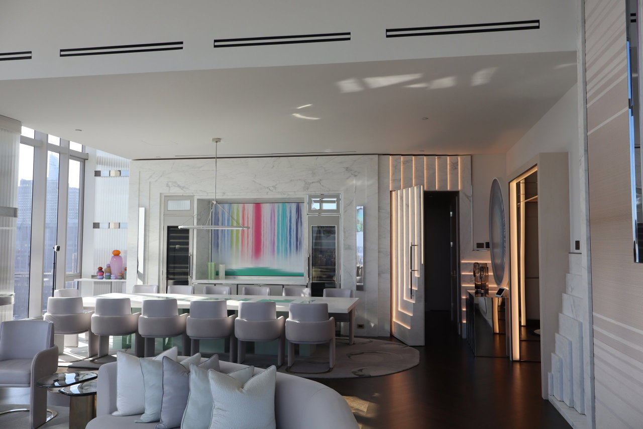 Marble pivot door in a private home in New York City with FritsJurgens System M+ pivot hinge system inside
