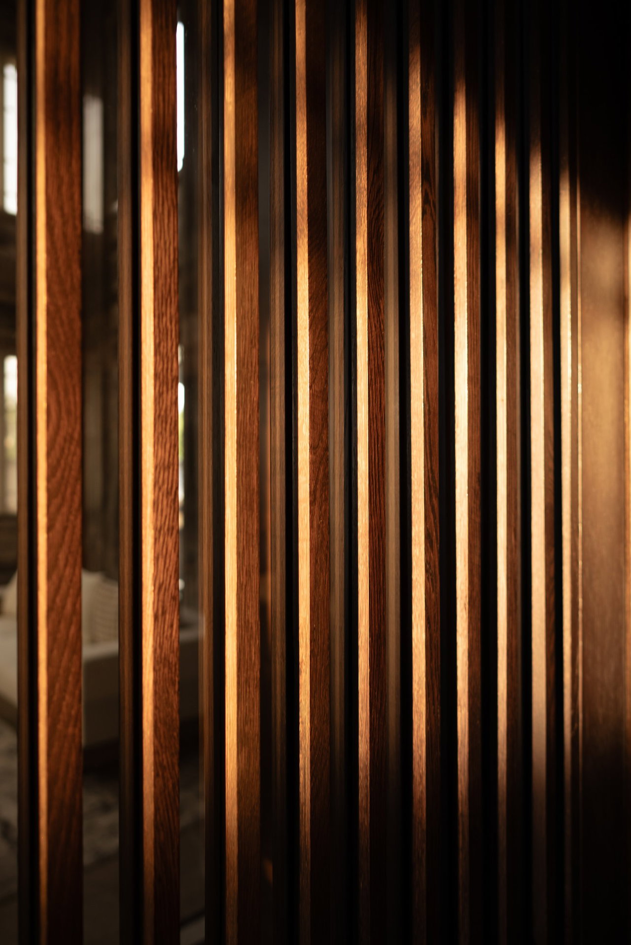 Wooden pivot door in a private home in Surabaya with FritsJurgens System M+ pivot hinge system inside