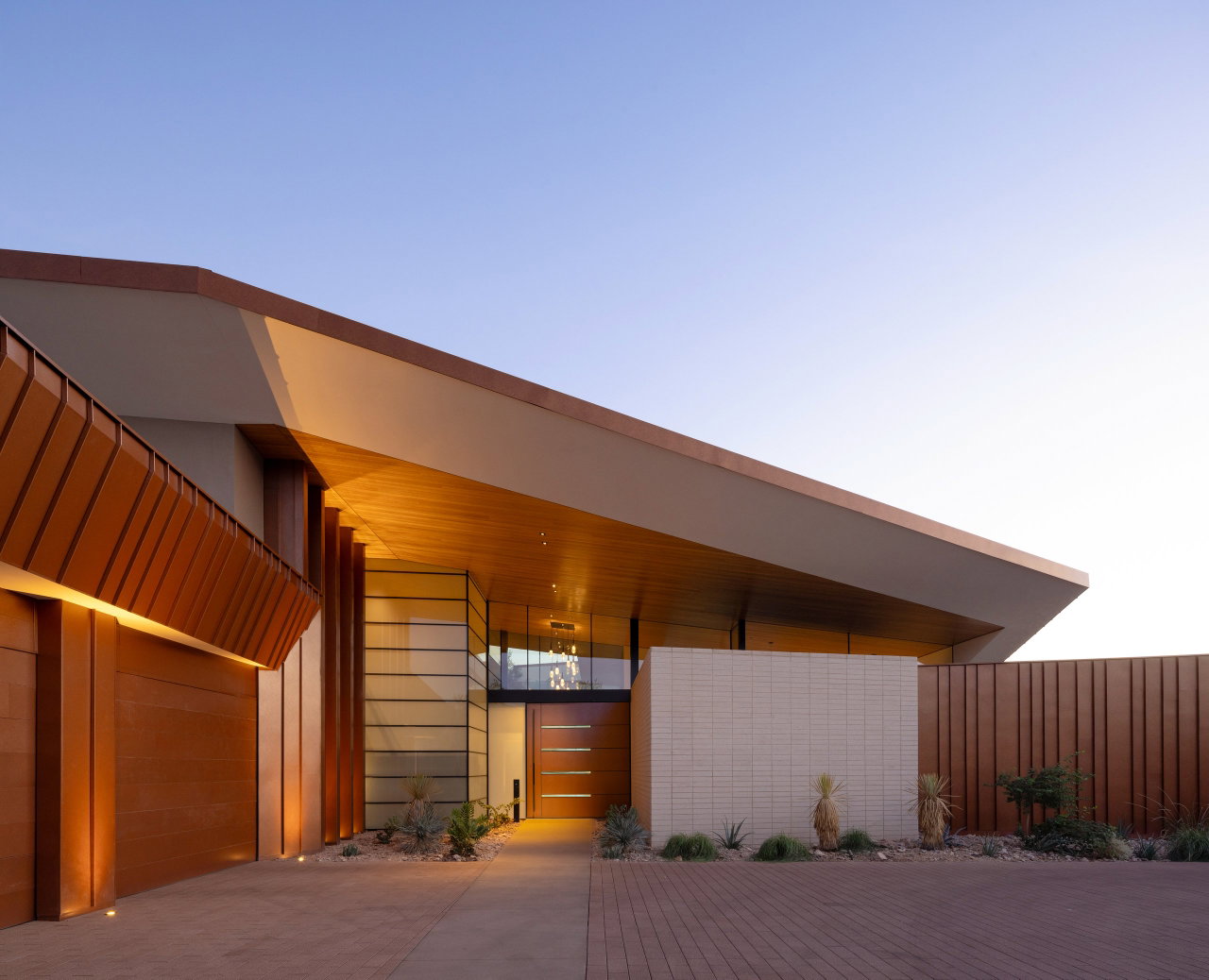 Steel pivot door in a private home in Paradise Valley with FritsJurgens System M+ pivot hinge system inside