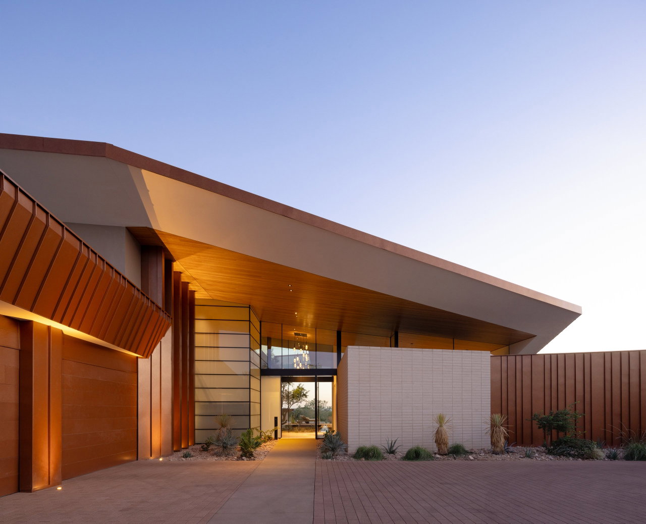 Steel pivot door in a private home in Paradise Valley with FritsJurgens System M+ pivot hinge system inside