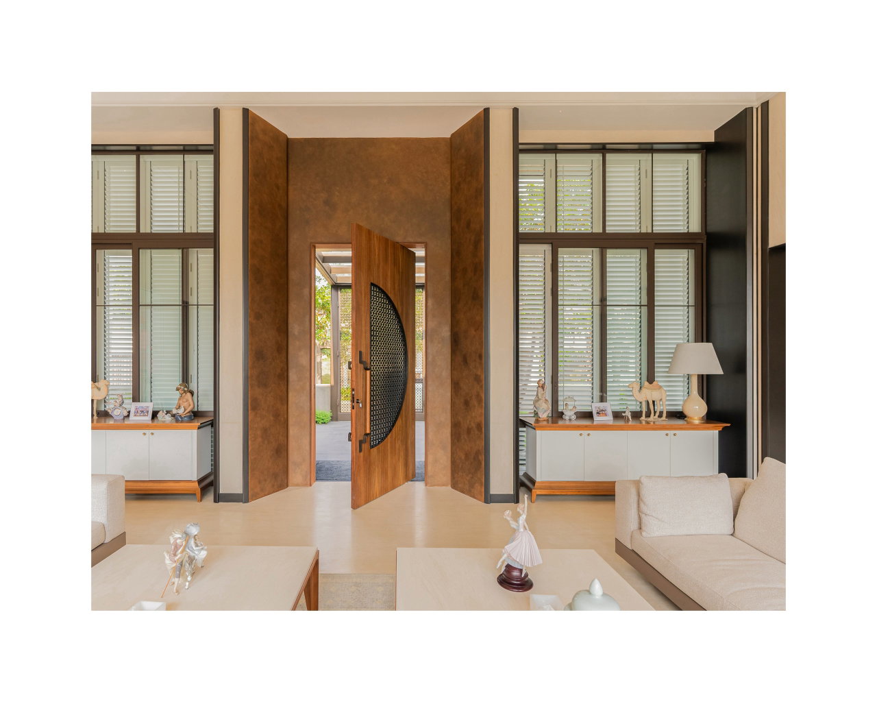Wooden pivot door in a private home in Bogor with FritsJurgens System M+ pivot hinge system inside