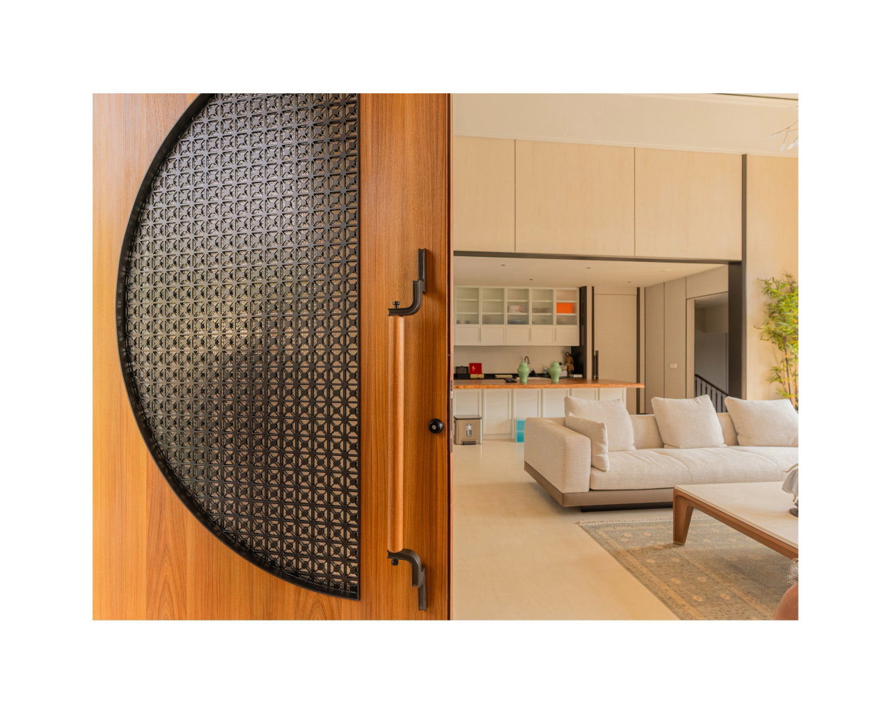 Wooden pivot door in a private home in Bogor with FritsJurgens System M+ pivot hinge system inside