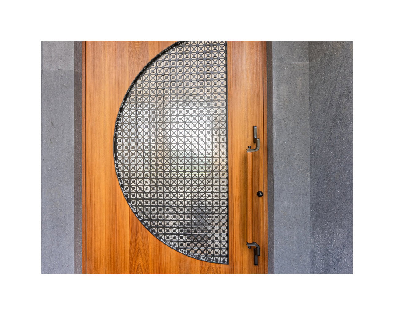 Wooden pivot door in a private home in Bogor with FritsJurgens System M+ pivot hinge system inside