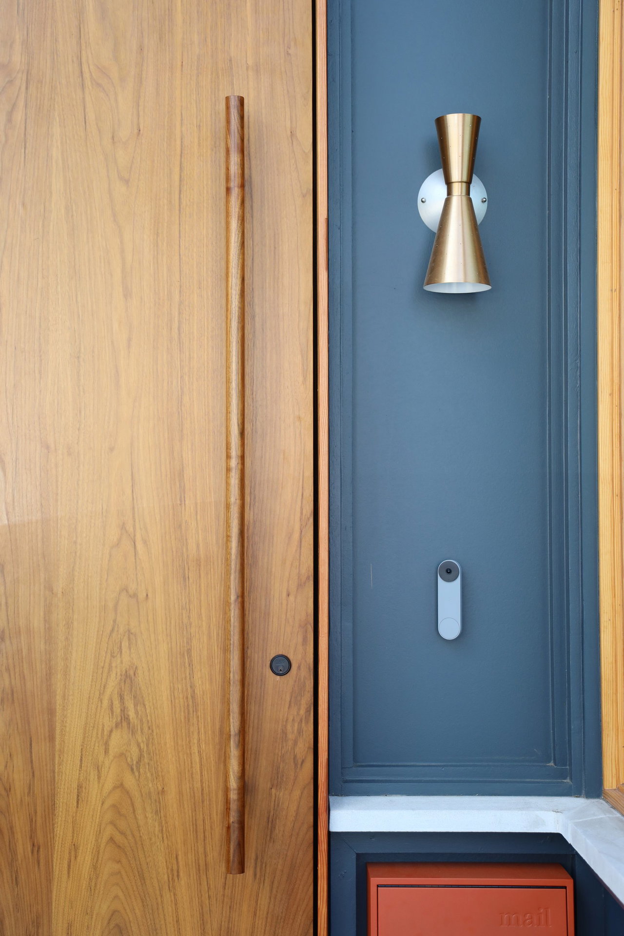 Wooden pivot door in an office in Athens with FritsJurgens System M+ pivot hinge system inside