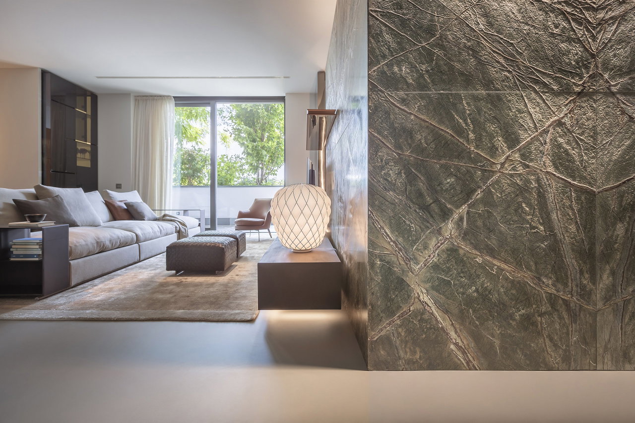 Marble pivot door in a private home in Milan with FritsJurgens System 3 pivot hinge system inside