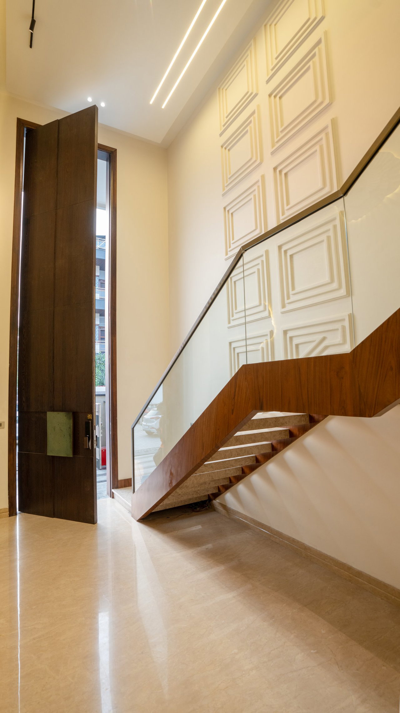 Wooden pivot door in a private home in Karnal with FritsJurgens System M+ pivot hinge system inside