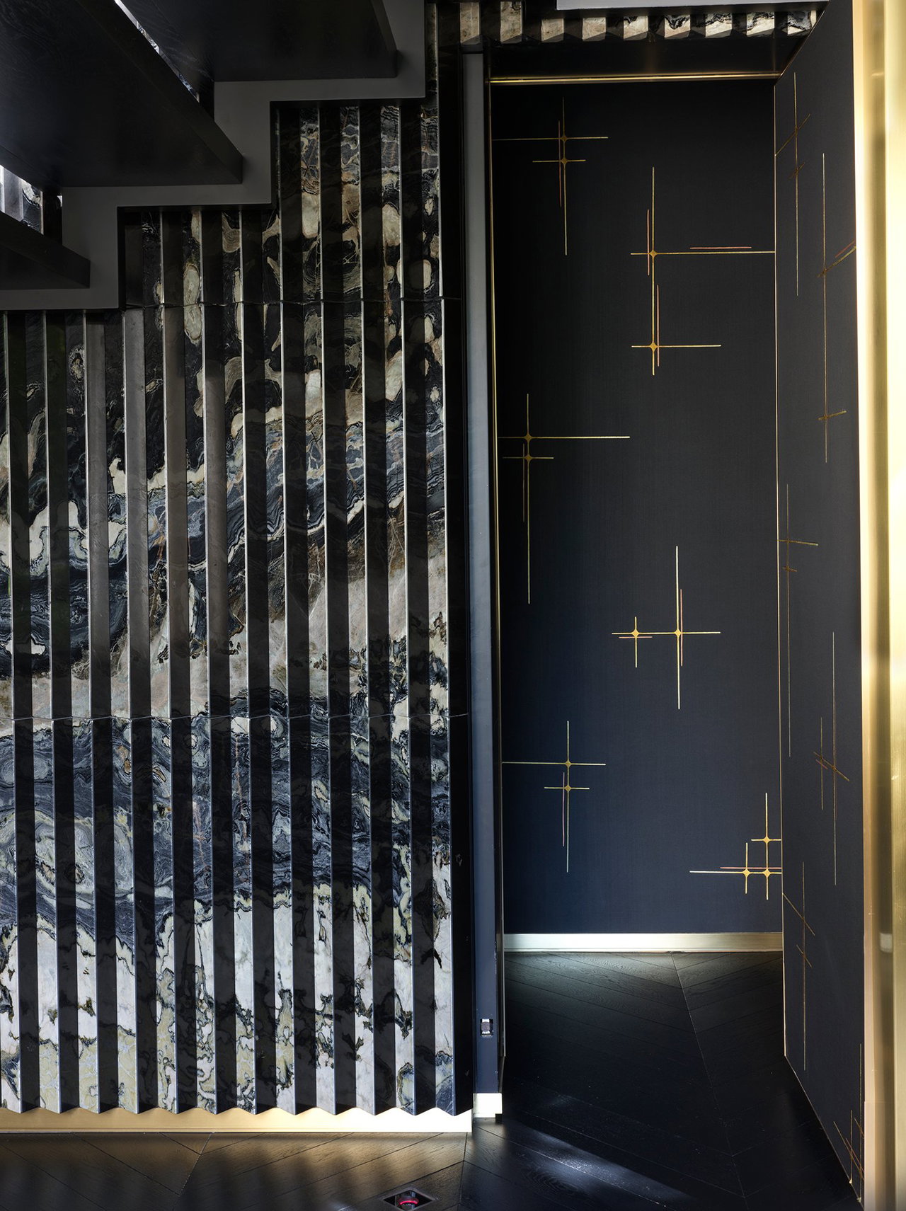 Marble pivot door in a private home in Atlanta with FritsJurgens System M+ pivot hinge system inside