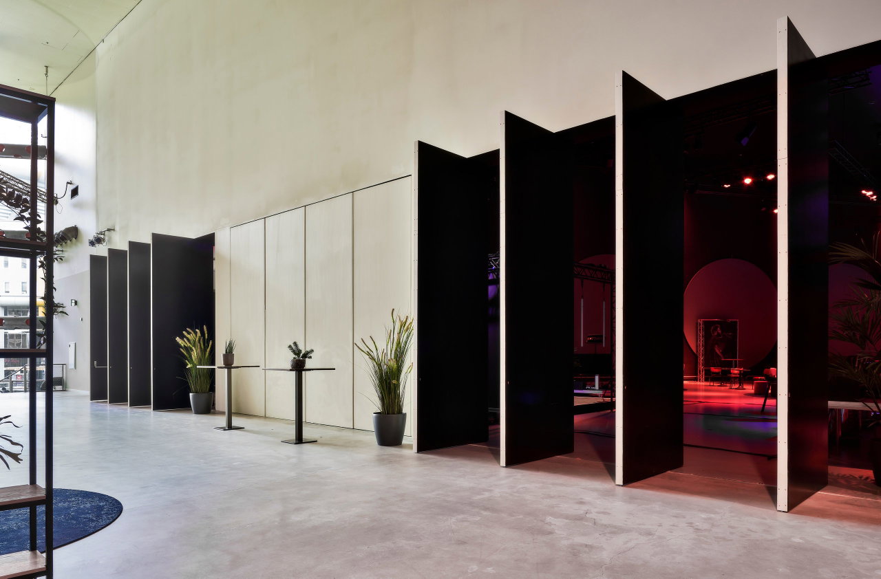 Wooden pivot door in a public building in Amsterdam with FritsJurgens System M pivot hinge system inside