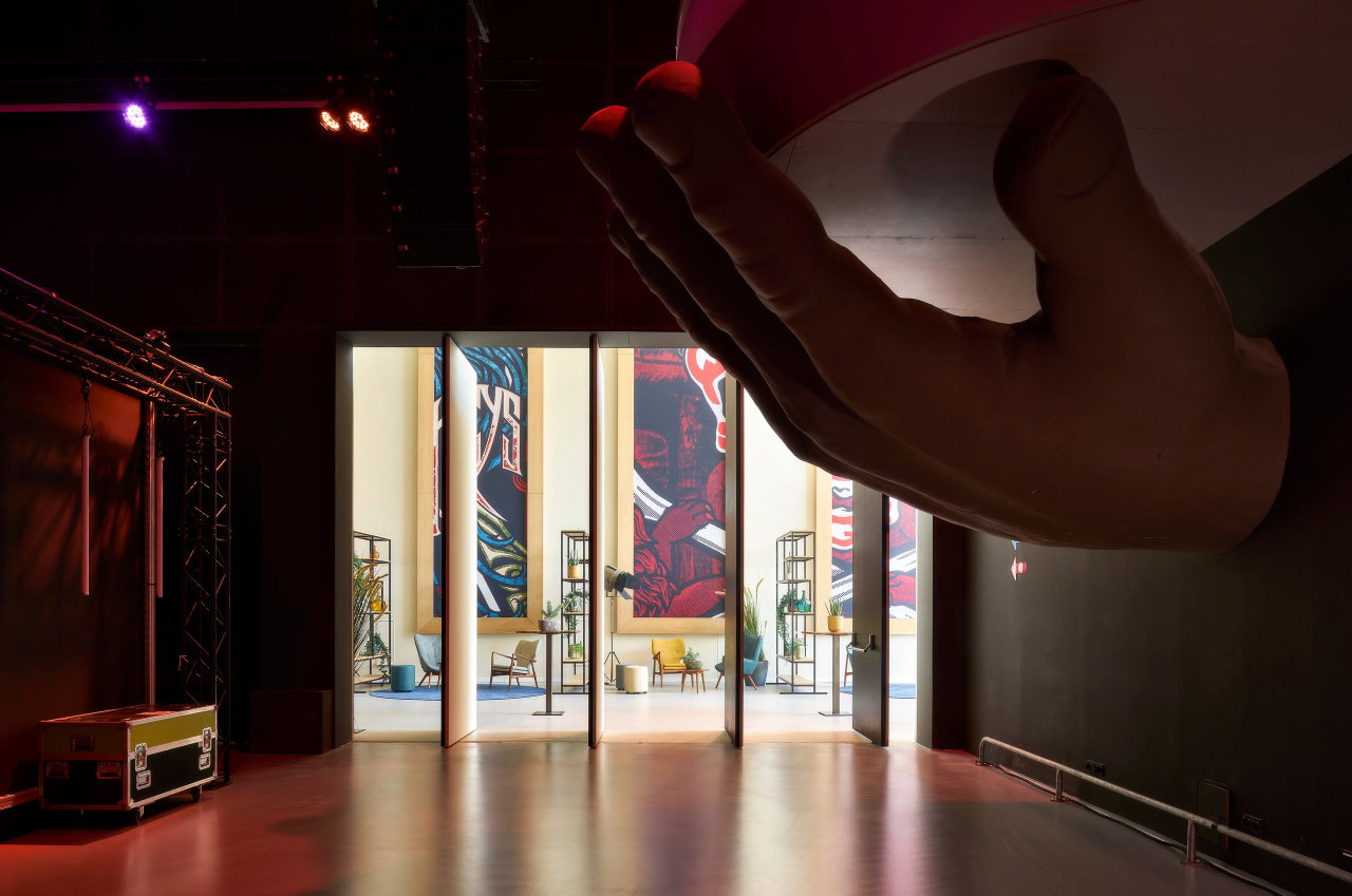 Wooden pivot door in a public building in Amsterdam with FritsJurgens System M pivot hinge system inside