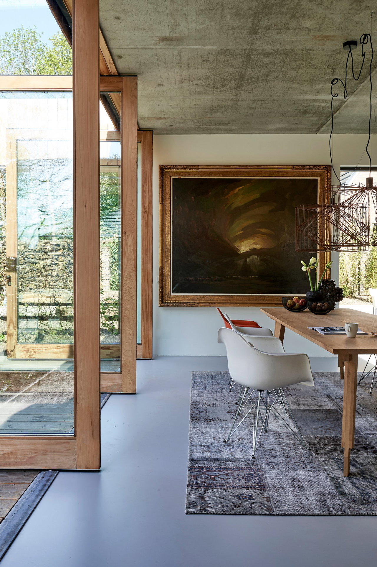 Wooden pivot door in a private home in Gilze with FritsJurgens System One pivot hinge system inside