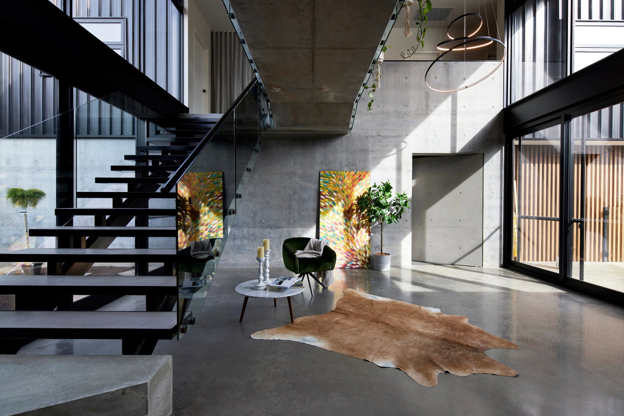 Stone pivot door in a private home in Canberra with FritsJurgens System M pivot hinge system inside