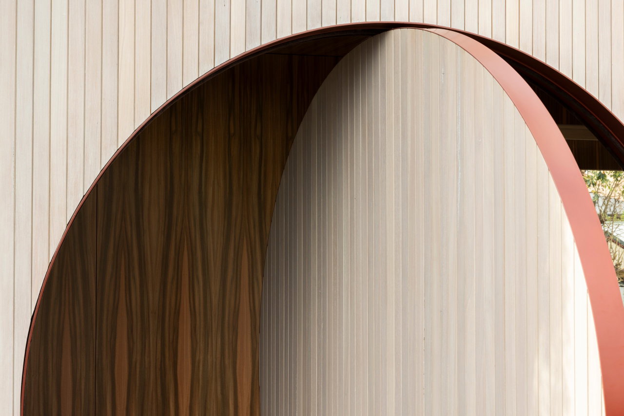 Wooden pivot door in a private home in Brisbane with FritsJurgens System 3 pivot hinge system inside