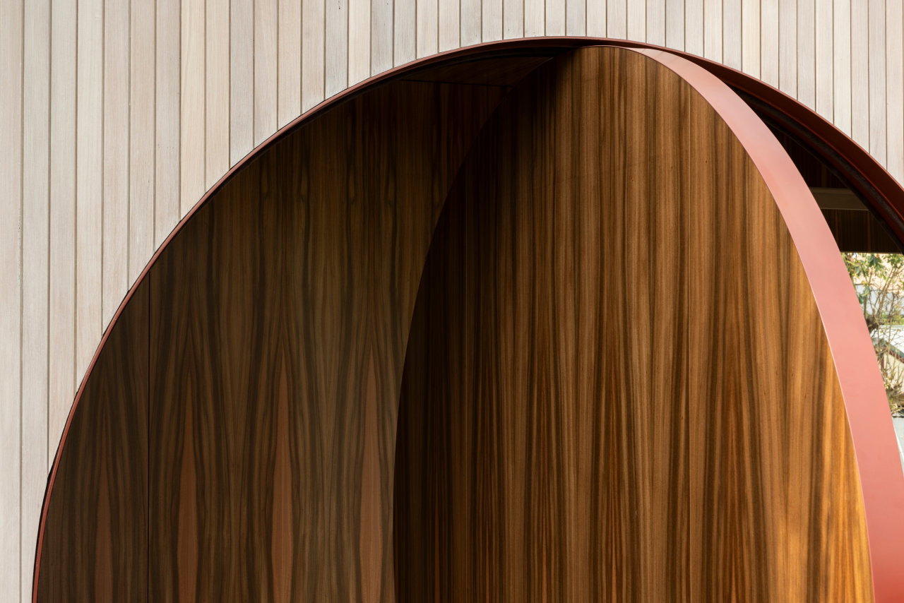 Wooden pivot door in a private home in Brisbane with FritsJurgens System 3 pivot hinge system inside