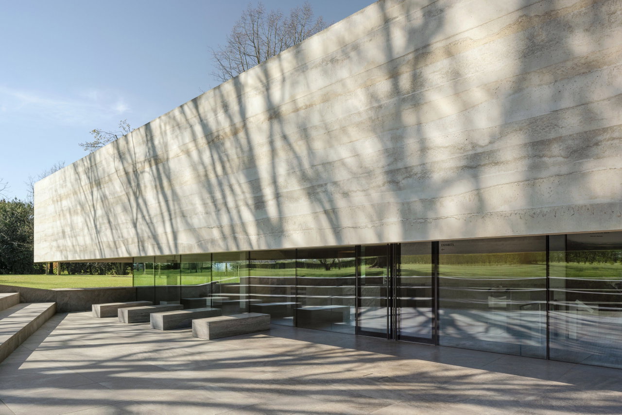 Steel and glass pivot door at a public site in Margraten with FritsJurgens System M+ pivot hinge system inside