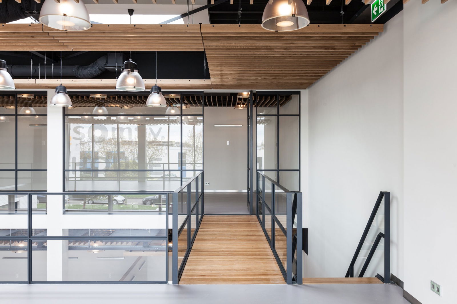 steel-framed glassdoor - opened pivot door - FritsJurgens.
