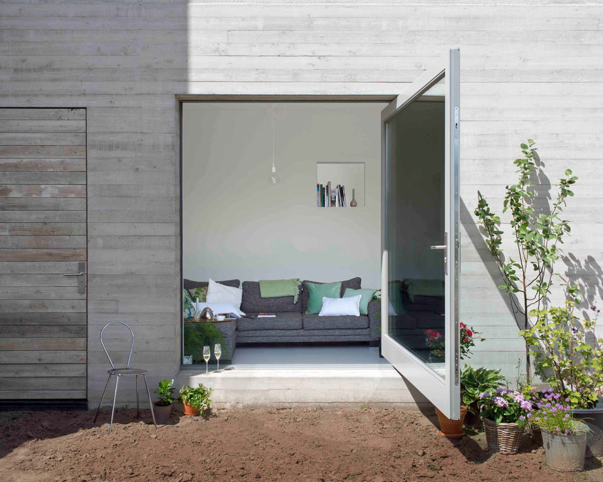 Exterior oversized door of glass and steel - FritsJurgens pivot hinges Inside