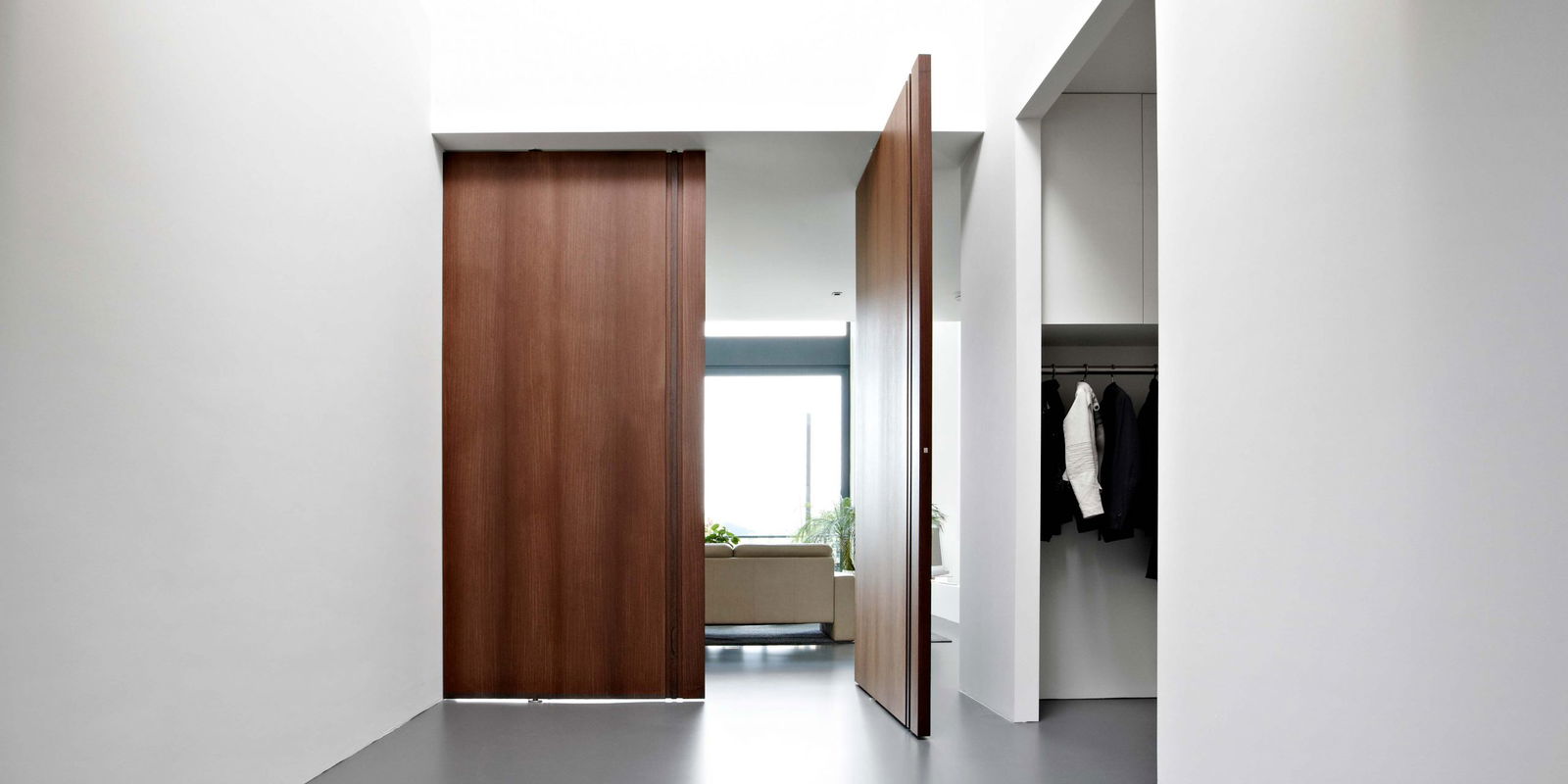 Wooden interior pivot doors with FritsJurgens pivot hinge inside.