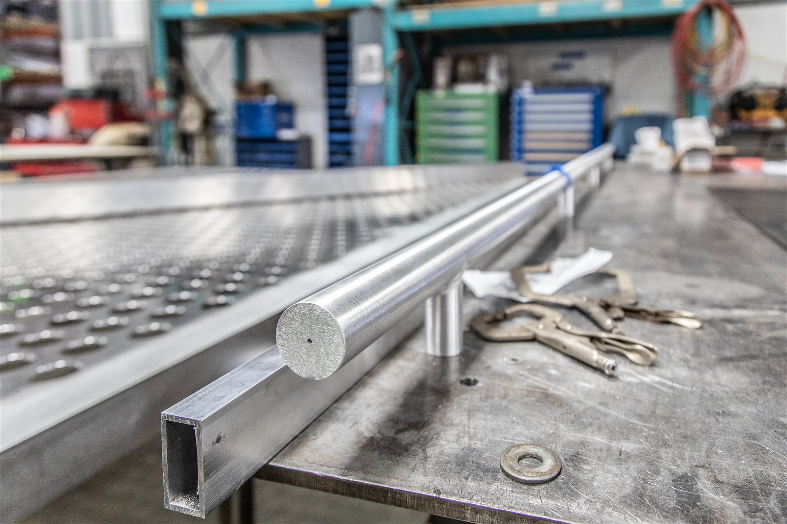 Aluminum pivot door fabrication with FritsJurgens pivot hinges inside.